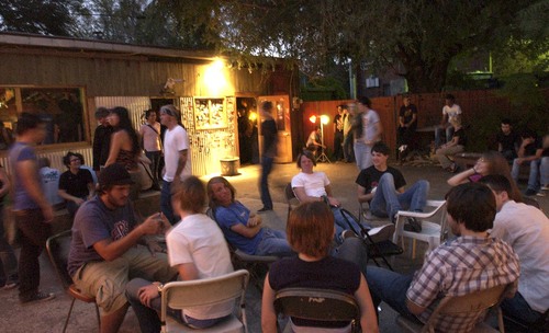 Tribune file photo

Kids hang out between bands in the open air area at Kilby Court in 2004.