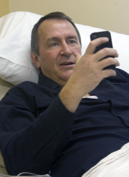 AL HARTMANN | The Salt Lake Tribune file
Utah Attorney General Mark Shurtleff was in good spirit as he started his first chemotherapy infusion treatment Monday at the  Jordan Valley Hospital Office of Utah Cancer Specialists. Shurtleff multi-tasks on his phone just before the chemo therapy is delivered.