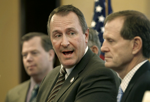 Scott Sommerdorf  |  Salt Lake Tribune
LEGISLATURE
Utah Attorney General Mark Shurtleff praises legislators inluding Representative Brad Dee (R; Ogden), (right), during a press conference where legislators and law enforcement reported some successes by the SECURE strike force, which is cracking down on crime committed by undocumented immigrants, Friday, 2/26/2010.