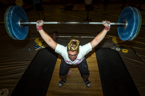 Chris Detrick  |  The Salt Lake Tribune
Maegan Snodgrass, of Salt Lake City, practices the snatch before competing in the USA Weightlifting National Championships at The Grand America Hotel Thursday July 17, 2014.