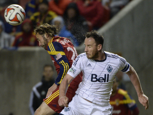 Rick Egan  |  The Salt Lake Tribune

Real Salt Lake midfielder Ned Grabavoy (20) collides with Vancouver FC defender Andy O'Brien (40), in MLS action, Real Salt Lake vs. The Vancouver Whitecaps, Wednesday, April 23, 2014