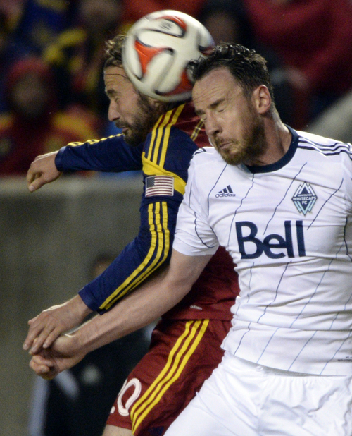 Rick Egan  |  The Salt Lake Tribune

Real Salt Lake midfielder Ned Grabavoy (20) collides with Vancouver FC defender Andy O'Brien (40), in MLS action, Real Salt Lake vs. The Vancouver Whitecaps, Wednesday, April 23, 2014