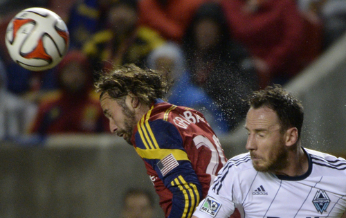 Rick Egan  |  The Salt Lake Tribune

Real Salt Lake midfielder Ned Grabavoy (20) collides with Vancouver FC defender Andy O'Brien (40), in MSL action, Real Salt Lake vs. The Vancouver Whitecaps, Wednesday, April 23, 2014