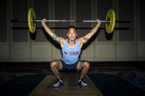 Chris Detrick  |  The Salt Lake Tribune
Dustin Ma, of Sandy, practices the snatch before competing in the USA Weightlifting National Championships at The Grand America Hotel Thursday July 17, 2014.