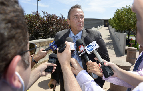 Francisco Kjolseth  |  The Salt Lake Tribune
Former Utah Attorney General Mark Shurtleff talks to reporters as he leaves the Salt Lake County Jail after being arrested earlier in the day on Tuesday, July 15, 2014.