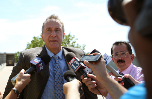 Melissa majchrzak  |  for The Salt Lake Tribune
Former Utah Attorney General Mark Shurtleff talks to reporters as he leaves the Salt Lake County Jail after being arrested earlier in the day on Tuesday, July 15, 2014.