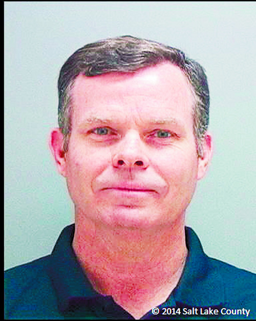 Former Utah Attorney General John Swallow is seen in his booking mug from the Salt Lake County Jail. He was arrested on July 15, 2014.