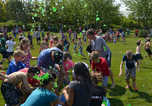 Leah Hogsten  |  The Salt Lake Tribune
Hundreds of Utahns threw food at each other Saturday. The inaugural Jiggle Fest at Thanksgiving Point Gardens, featured hourly jello fights and squeals of laughter July 19, 2014.