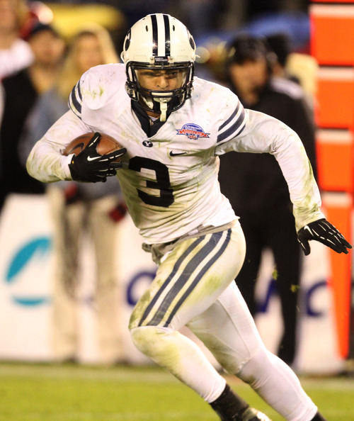 Rick Egan  | The Salt Lake Tribune 

Brigham Young linebacker Kyle Van Noy (3) runs for a touchdown for the Cougars, after intercepting a pass, in football action,  in the Poinsettia Bowl, Thursday, December 20, 2012.