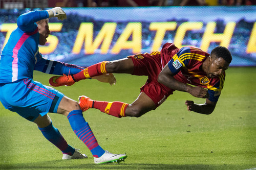 Trent Nelson  |  The Salt Lake Tribune
Real Salt Lake's Robbie Findley (10) collides with Vancouver's David Ousted (1) as Real Salt Lake hosts Vancouver Whitecaps FC at Rio Tinto Stadium in Sandy, Saturday July 19, 2014.