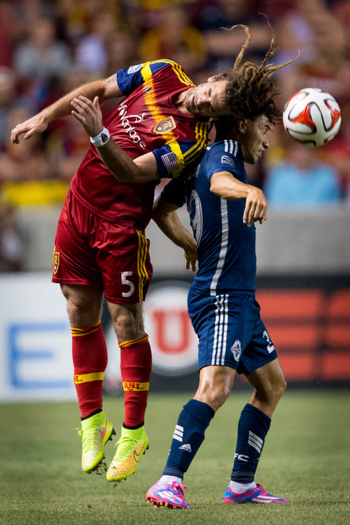 Trent Nelson  |  The Salt Lake Tribune
Real Salt Lake's Kyle Beckerman (5) stretches for the ball, going around Vancouver's Nicolás Mezquida (29), as Real Salt Lake hosts Vancouver Whitecaps FC at Rio Tinto Stadium in Sandy, Saturday July 19, 2014.