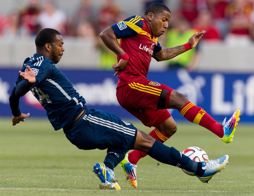 Trent Nelson  |  The Salt Lake Tribune
Real Salt Lake's Joao Plata (8) and Vancouver's Carlyle Mitchell (24) race for the ball as Real Salt Lake hosts Vancouver Whitecaps FC at Rio Tinto Stadium in Sandy, Saturday July 19, 2014.