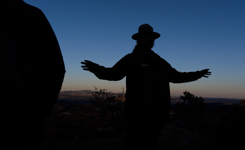 Franciso Kjolseth  |  The Salt Lake Tribune
Bryce Canyon Dark Ranger Kevin Poe leads a group of visitors on full moon walk and the rare treat of experiencing a blood moon during a lunar eclipse in a location famed for its dark skies.