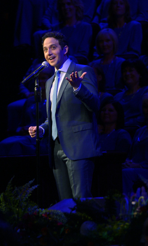 Leah Hogsten  |  The Salt Lake Tribune
Santino Fontana sings with the Mormon Tabernacle Choir and Orchestra at Temple Square during the "A Summer Celebration of Song" Pioneer Day concert, July 18, 2014 at the Conference Center.