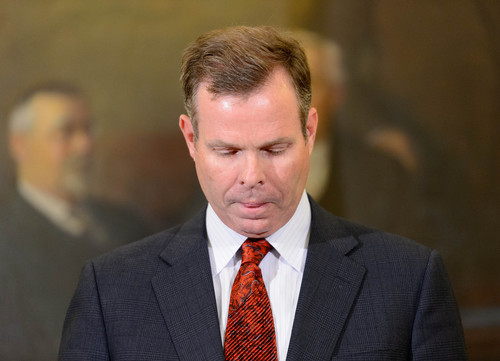 Trent Nelson  |  Tribune file photo
Utah Attorney General John Swallow announces his resignation Thursday, Nov. 21, 2013, in Salt Lake City. FBI and state law enforcement agents searched Swallow's residence in Sandy on Monday.