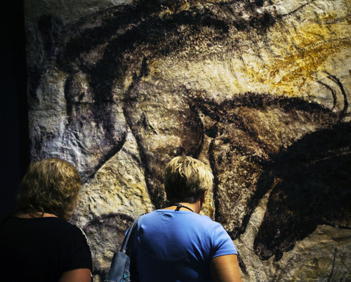 Steve Griffin  |  The Salt Lake Tribune


Visitors look at a reproduction of horses painted in the Pech Merle Cave in southern France at least 16,000 years ago during the opening of "The Horse"--an exhibit from the American Museum of Natural History in New York City, in Salt Lake City, Utah Monday, July 21, 2014. Modern research suggests Ice Age artists took pigment into their mouths and blew it out of a bone tube creating the image. The exhibit illuminates the story of how humans have shaped the horse and how the horse, in turn, has shaped us. The special exhibition includes cultural objects from around the world, a hand-painted diorama depicting the evolution of the horse and interactive displays that invite visitors to test their strength in horsepower, identify different breeds and look inside a life-size, moving horse.