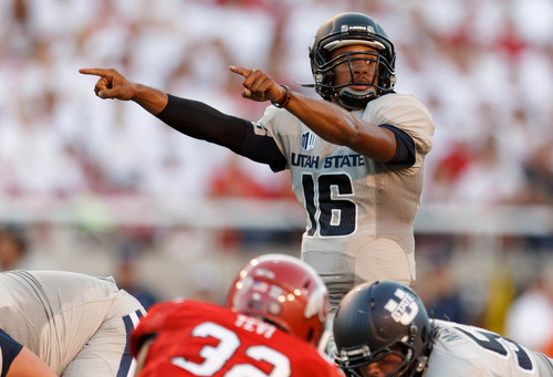 Trent Nelson  |  The Salt Lake Tribune
Utah State Aggies quarterback Chuckie Keeton (16) controlling the offense on a touchdown drive as the University of Utah hosts Utah State, college football Thursday, August 29, 2013 at Rice-Eccles Stadium in Salt Lake City.