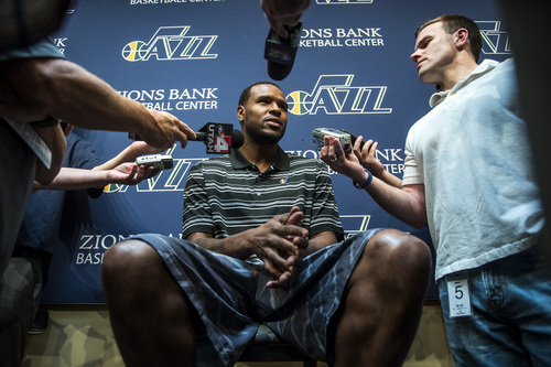 Chris Detrick  |  The Salt Lake Tribune
Utah Jazz's Trevor Booker talks to reporters during a press conference at the Zions Bank Basketball Center Tuesday July 22, 2014.