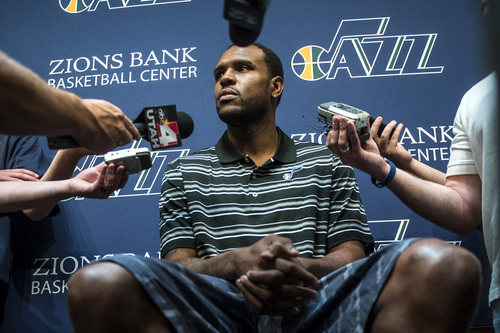 Chris Detrick  |  The Salt Lake Tribune
Utah Jazz's Trevor Booker talks to reporters during a press conference at the Zions Bank Basketball Center Tuesday July 22, 2014.