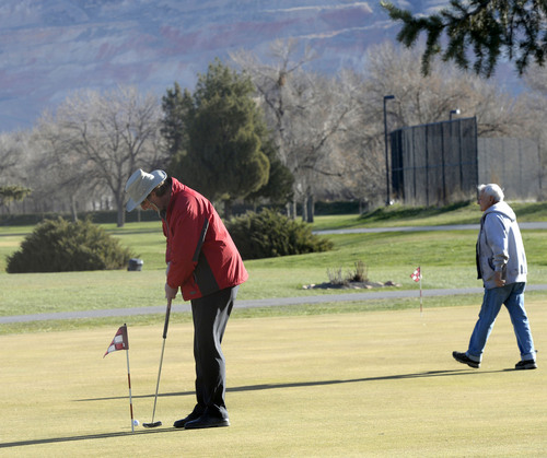 Al Hartmann  |  The Salt Lake Tribune
Early morning golfers warm up on the putting green at Rose Park Golf Course in Salt Lake City Thursday March 20. A new report reveals that Salt Lake City's golf courses lack financial viability. Among the money losers is the Rose Park 18-hole golf course. The consultant said the city should close it entirely or completely revamp it.