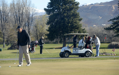Al Hartmann  |  The Salt Lake Tribune
Early morning golfers start on the front nine at Rose Park Golf Course in Salt Lake City Thursday March 20. 
 A new report reveals that Salt Lake City's golf courses lack financial viability. Among the money losers is the Rose Park 18-hole golf course. The consultant said the city should close it entirely or completely revamp it.