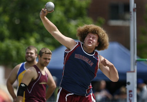 Scott Sommerdorf   |  The Salt Lake Tribune
Andre James of Herriman wins the Boys 4A Shot Put finals with a toss of 54.11 at  the State High School track meet held at BYU, Saturday, May 18, 2013.
