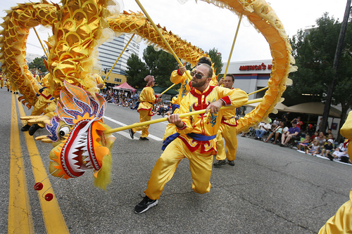 Scott Sommerdorf   |  The Salt Lake Tribune
The Chinese Society of Utah entry during the Pioneer Day Parade, Wednesday, July 24, 2013.