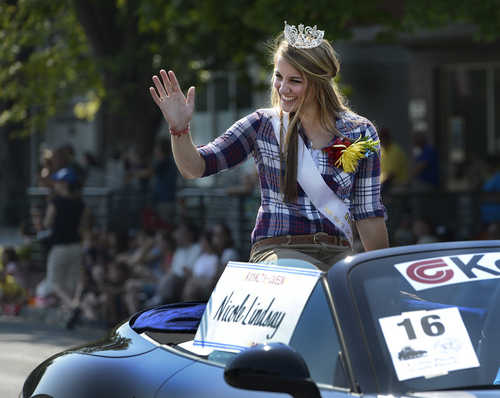 Scott Sommerdorf   |  The Salt Lake Tribune
Parade Queen Nicole Lindsay waves during the annual Days of '47 Youth Parade as it flowed through downtown Salt Lake City going west on 500 South and ending at Washington Square, where the Days of '47 Family Festival was held, Saturday, July 19, 2014.