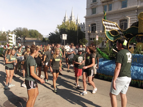 Sean P. Means  |  The Salt Lake Tribune
Members of Utah Valley University's soccer team kick the ball around before the 2014 Days of '47 Parade in downtown Salt Lake City, Thursday, July 24, 2014.