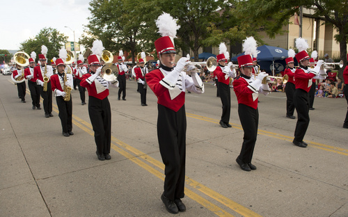 Rick Egan  |  The Salt Lake Tribune

The Park CIty Band does let the 100 degree temperature stop them from marching in their full uniforms, in the Handcart Days Parade in Bountiful, Wednesday, July 23, 2014