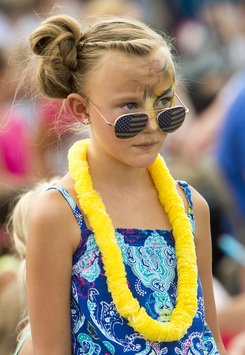 Rick Egan  |  The Salt Lake Tribune

Kenzie Olsen, 8, had her face painted for the Handcart Days Parade in Bountiful, Wednesday, July 23, 2014