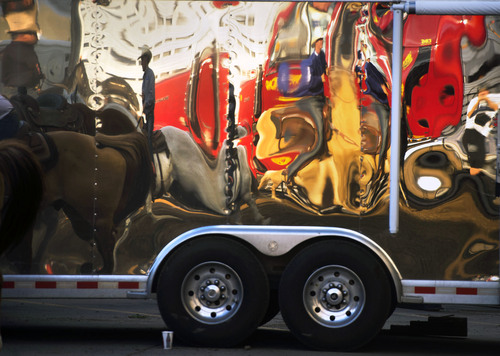 Steve Griffin  |  The Salt Lake Tribune


Cowboys and cowgirls are reflected in a chrome horse trailer as they warm up their horses outside EnergySolutions Arena during the Days of '47 Rodeo at  in Salt Lake City, Utah Wednesday, July 23, 2014.
