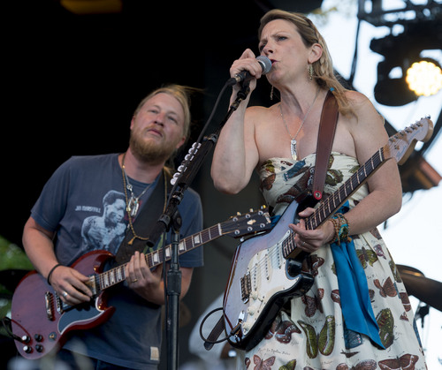 Steve Griffin  |  The Salt Lake Tribune


Husband-and-wife Derek Trucks and Susan Tedeschi jam together during the Tedeschi Trucks Band show at the Red Butte Garden Concert Series in Salt Lake City, Utah Tuesday, July 22, 2014. The band is an 11-member collective that thrills audiences worldwide with its transcendent live performances and award-winning albums. The band was formed in 2010 Tedeschi and Trucks.