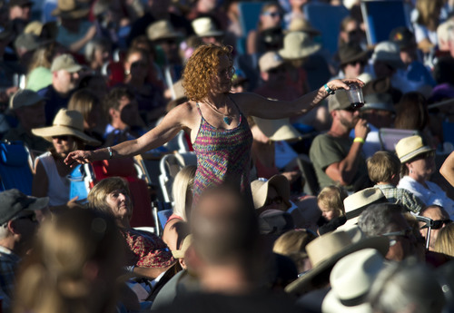 Steve Griffin  |  The Salt Lake Tribune


Audience members dance to the music during the Tedeschi Trucks Band show at the Red Butte Garden Concert Series in Salt Lake City, Utah Tuesday, July 22, 2014. The band is an 11-member collective that thrills audiences worldwide with its transcendent live performances and award-winning albums. The band was formed in 2010 Tedeschi and Trucks.