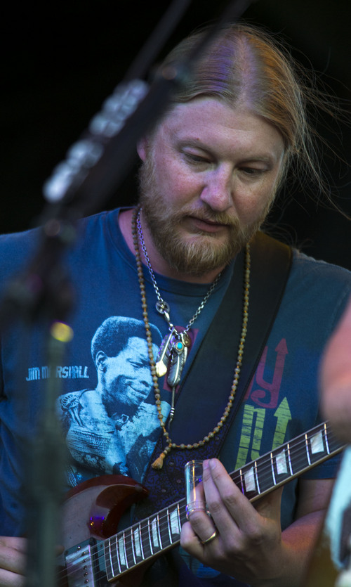 Steve Griffin  |  The Salt Lake Tribune


Derek Trucks plays the guitar during the Tedeschi Trucks Band show at the Red Butte Garden Concert Series in Salt Lake City, Utah Tuesday, July 22, 2014. The band is an 11-member collective that thrills audiences worldwide with its transcendent live performances and award-winning albums. The band was formed in 2010 by husband-and-wife Susan Tedeschi and Derek Trucks.