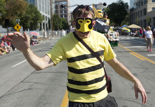 Rick Egan  |  The Salt Lake Tribune

Bret Olsen dresses as a bee in The Days of 47 Pioneer Parade, makes it's way down 200 East, in Salt Lake City, Thursday, July 24, 2014