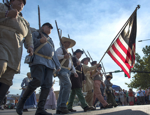 Rick Egan  |  The Salt Lake Tribune

The Utah Living History Associatoin representing the Mormon Battalion, leads the Days of 47 Pioneer Parade, in Salt Lake City, Thursday, July 24, 2014
