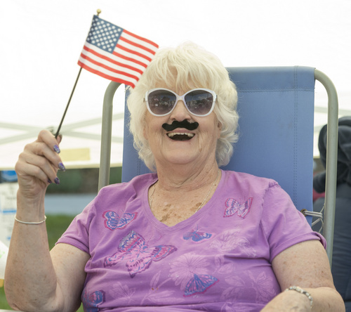 Rick Egan  |  The Salt Lake Tribune

Sally Kadlec, Draper, wears a fake mustache, as she enjoys the Days of 47 Pioneer Parade, in Salt Lake CIty, Thursday, July 24, 2014