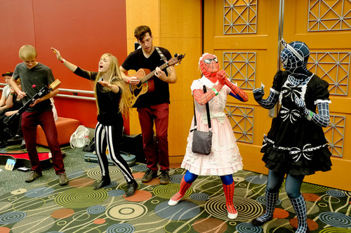Trent Nelson  |  The Salt Lake Tribune
The band Shrink the Giant performs in the hallway at Salt Lake Comic Con in Salt Lake City Saturday, September 7, 2013.