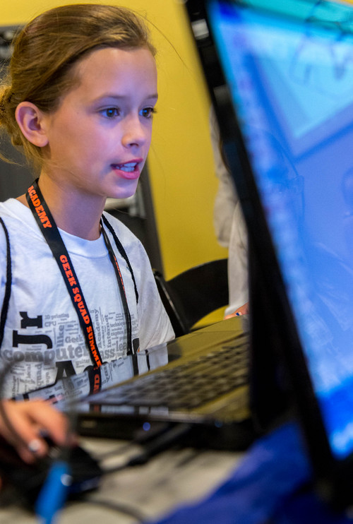 Trent Nelson  |  The Salt Lake Tribune
Sadie Badger working in a 3-D printing class put on by Geek Squad Academy at the Discovery Gateway Children's Museum in Salt Lake City, Wednesday July 16, 2014.  The two-day camp puts kids through five different classes: 3-D imaging, film and script, digital music, digital responsibility and robotics.