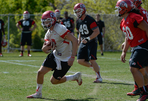 Franciso Kjolseth  |  The Salt Lake Tribune
University of Utah quarterback Travis Wilson works out with the team as they get gets ready for the season during Spring practice at the Spence Eccles Football Facility on Thursday, April 17, 2014.