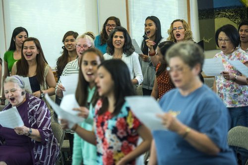Chris Detrick  |  The Salt Lake Tribune
Members of the Salt Lake Choral Artists, community singers and guests from the Philippines sing during a choir camp practice Friday July 11, 2014.