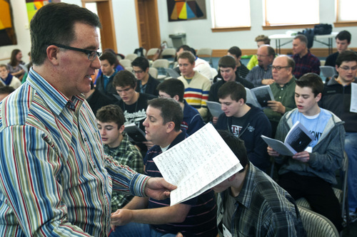 Chris Detrick  |  Tribune file photo
Artistic director Brady Allred conducts members of the Salt Lake Choral Artists and the Youth Honor Choir during a rehearsal at the Salt Lake Choral Artists Building Saturday January 5, 2013.