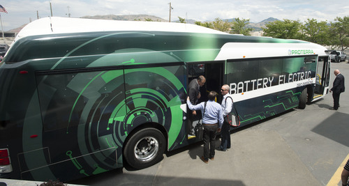Steve Griffin  |  The Salt Lake Tribune


UTA officials climb on board for a ride around town in a Proterra battery electric 40-foot bus at UTA offices in Salt Lake City, Utah Monday, July 28, 2014. UTA is considering buying some of the $825,000 buses.