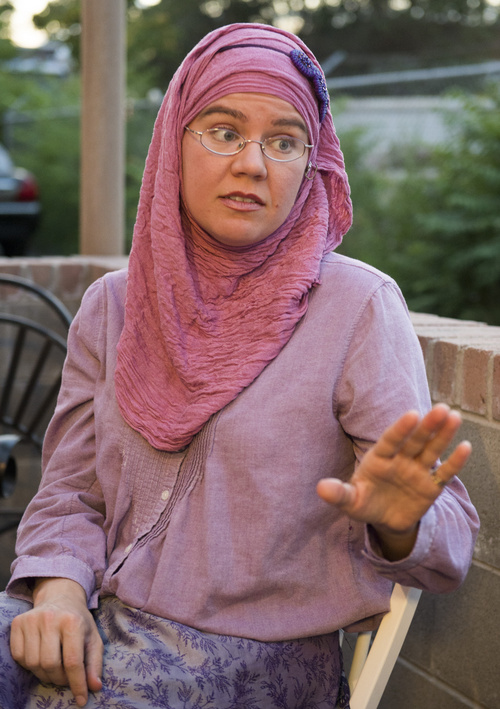 Rick Egan  |  The Salt Lake Tribune

Chiloh Harville talks about her religion, and  the group of Muslims she belongs to, that contribute to a fund for Palestinians, as they meet to break their fast at Curry Fried Chicken,  Wednesday, July 23, 2014.
