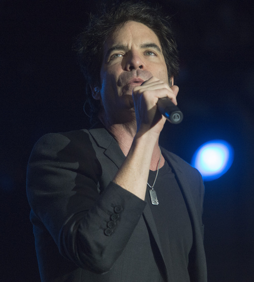 Rick Egan  |  The Salt Lake Tribune

Pat Monahan, sings for Train as at the play   free concert outside EnergySolutions Arena, Saturday, July 26, 2014