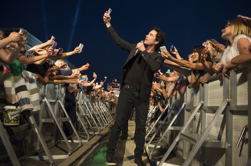 Rick Egan  |  The Salt Lake Tribune

Train lead singer, Pat Monahan, takes a selfie with fans, during their free concert outside EnergySolutions Arena, Saturday, July 26, 2014