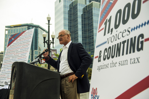 Chris Detrick  |  The Salt Lake Tribune
Barry Goldwater, Jr. speaks during a rally against Rocky Mountain Power's proposed fee on solar-equipped customers Tuesday July 29, 2014.