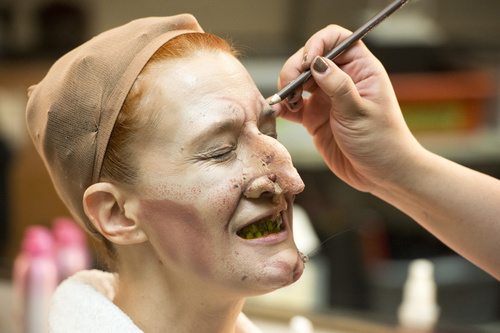 Rick Egan  |  The Salt Lake Tribune
Natalia Castilla, Hair and Makeup Director, applies make up to Misty Cotton, for her role as The Witch, in the Utah Shakespeare Festival's "Into The Woods"  Saturday, July 5, 2014