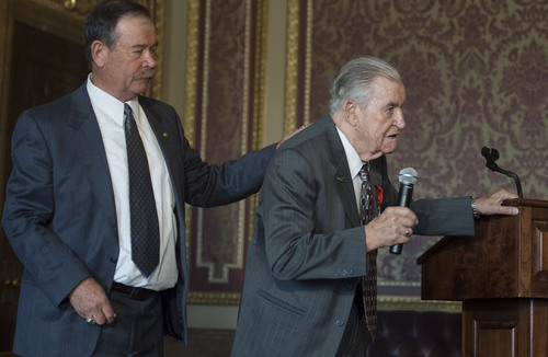 Steve Griffin  |  The Salt Lake Tribune


Roger Larson, left, stands with his father, World War II veteran Dean C. Larson as he tells a story about heading to war after the World War II veteran was awarded the French Legion of Honor in the Gold Room at the Utah Capitol Thursday, July 31, 2014. He was given the honor by the French government for the merit and bravery he exhibited while fighting on French territory during World War II.